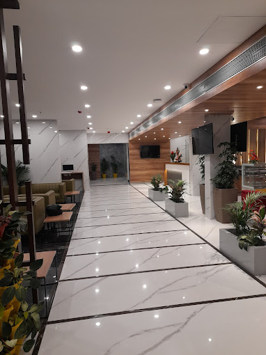 Hotel corridor and lounge seating at Iva By SKR